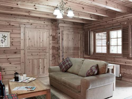 a living room with a couch and a table at Maple - Uk5501 in Killin