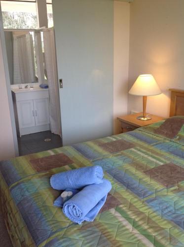 Postel nebo postele na pokoji v ubytování Motel Farnboro
