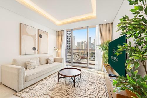 FIRST CLASS 1BR Burj Views , Prime Location