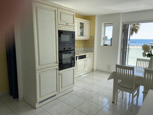 T2 clim, front de mer, balcon vue mer exceptionnelle classé 4OHA21