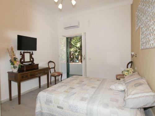 Кровать или кровати в номере Affittacamere Cecco Rooms