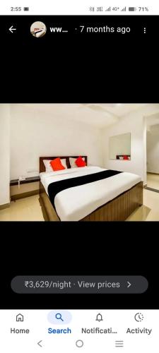 a screenshot of a bedroom with a bed at AB Merridien in Coimbatore
