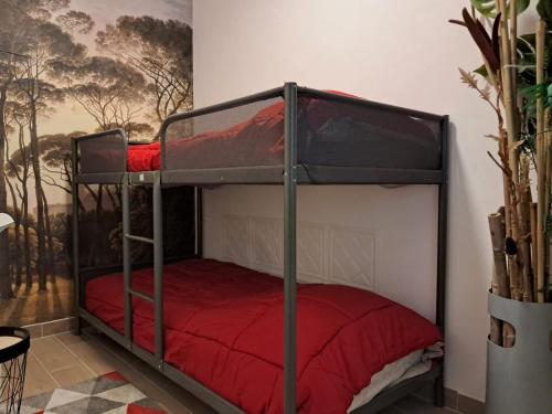 a bedroom with two bunk beds in a room at Sakura B&B Franciacorta in Cologne