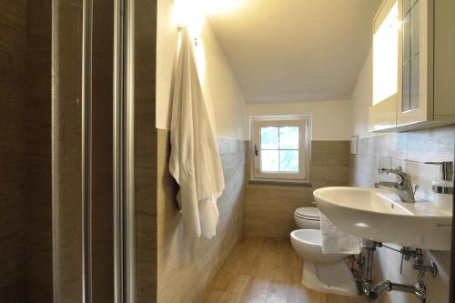 a bathroom with a sink and a toilet at Da Piero e Paola in Arezzo