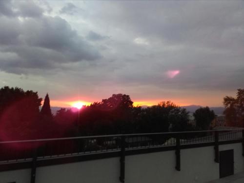 a sunset from the balcony of my apartment at Hotel Orchidea in Bardolino