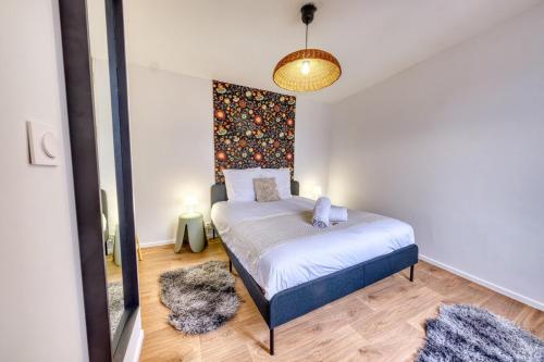 Llit o llits en una habitació de The Timothée