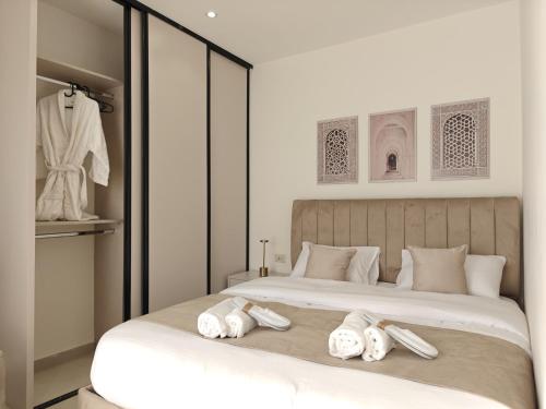 Llit o llits en una habitació de ذا سهل ستيز