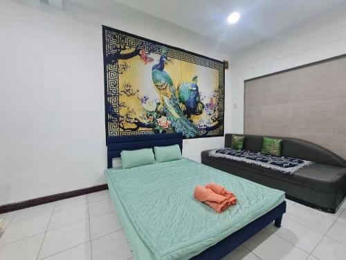 a living room with a bed and a couch at Myths Saigon in Ho Chi Minh City