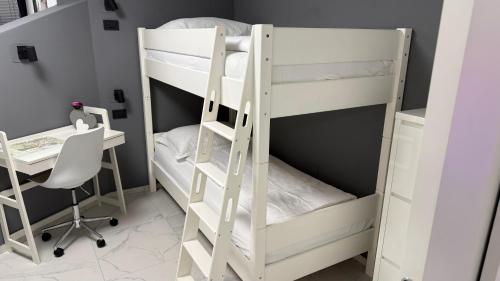Kama o mga kama sa kuwarto sa Apartment Aria