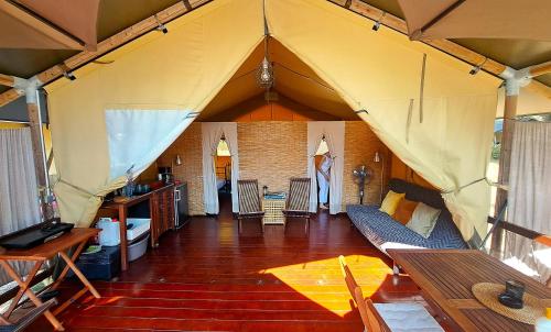 a large living room with a large tent at VELA Glamping - Camp Čikat - Lošinj in Mali Lošinj
