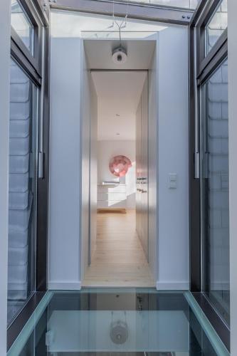 a hallway with a pool in a building at Home sweet Lux - 8P - House & garden - 280n m2 in Lorentzweiler