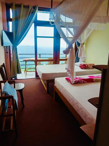 A bed or beds in a room at Cloudscape-Golkonda