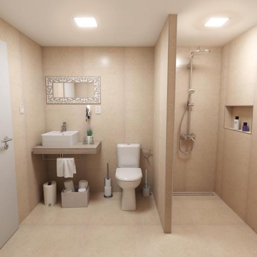 a bathroom with a toilet and a sink and a shower at Hotel Marcincak*** in Mikulov