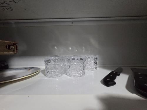a block of ice sitting on top of a counter at Apartment condo in Ajman in Ajman 