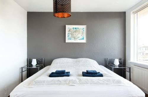 Vuode tai vuoteita majoituspaikassa Bla Hus B&B