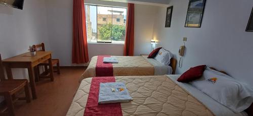 מיטה או מיטות בחדר ב-Krusty Hostel B&B