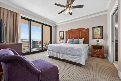 a hotel room with a bed and a balcony at Where the Harbor Wakes For 6 in Destin