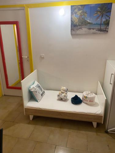 Wanna Bee tesisinde bir odada yatak veya yataklar
