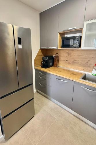 Apartments with hot tub Kastel Stafilic, Kastela - 25136
