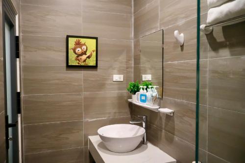 a bathroom with a sink and a toilet in it at Lumi Home Đà Lạt in Da Thanh