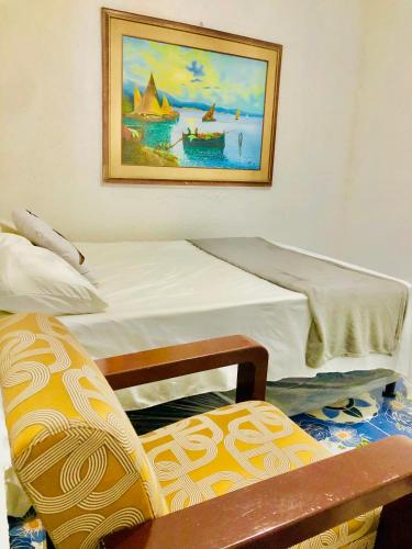 Llit o llits en una habitació de Hostal Los planes de Renderos