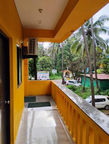 a view from the balcony of a house at Sai Sadan GuestHouse Goa in Calangute