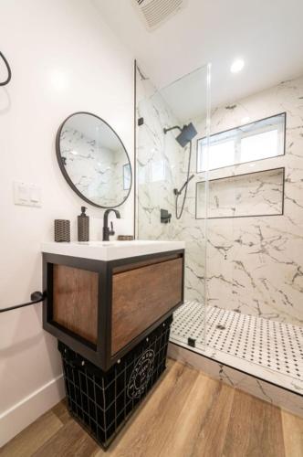 a bathroom with a sink and a mirror at Stellar Sherman Oaks One Bedroom close to Universal Studios in Burbank
