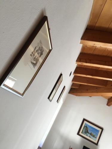 a view of the stairs in a house with a window at Casella's Apartment in Malcesine