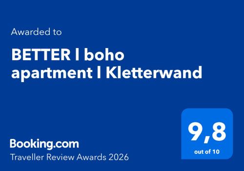 a blue sign with the words better ibo appointment i kiberatown at BETTER l boho apartment l Kletterwand in Altusried