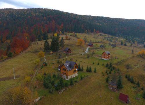 an aerial view of a house on a hill at Kozichky Guest House in Tatariv