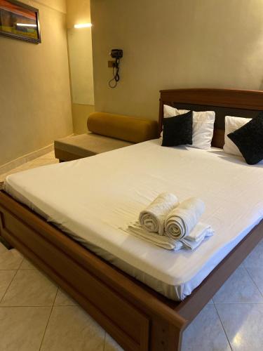 Postel nebo postele na pokoji v ubytování Grand Resort