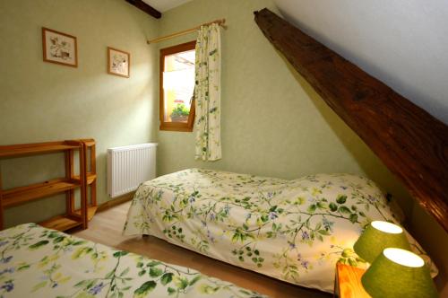 Llit o llits en una habitació de Dans l'impasse