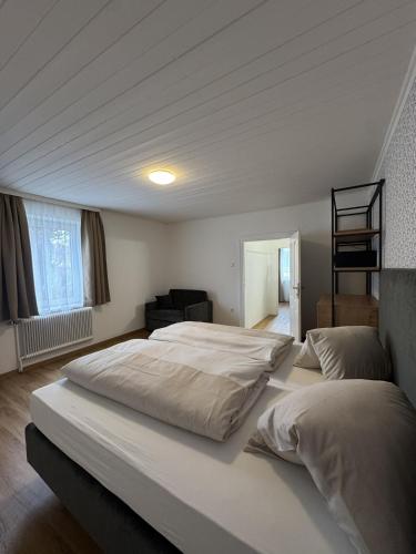 a bedroom with two beds in a room at rooms11 in Salzburg