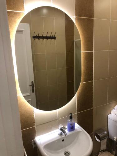 a bathroom with a sink and a mirror at The view resort nabq in Sharm El Sheikh