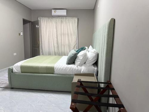 Llit o llits en una habitació de BNG Suites 1