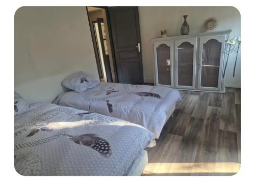 Llit o llits en una habitació de Maison à Nyons