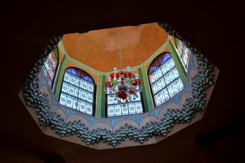 a chandelier is hanging from the ceiling of a building at Ksar Timnay Hotel in Aguelmous