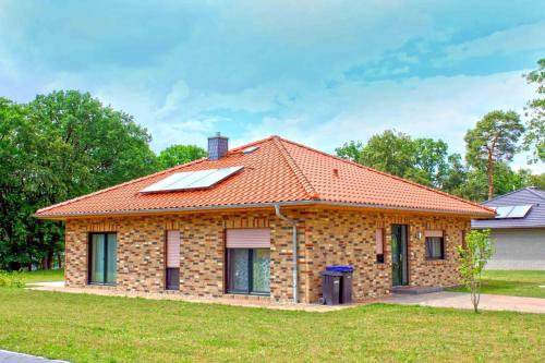 a house with solar panels on the roof at Peter in Lenz