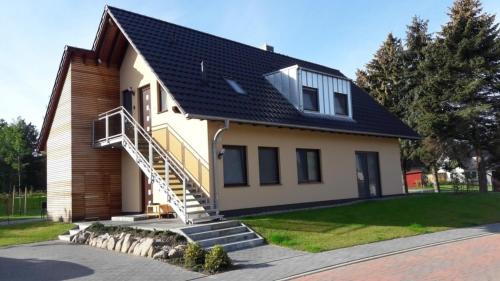 a house with a solar roof on top of it at Werner in Lenz