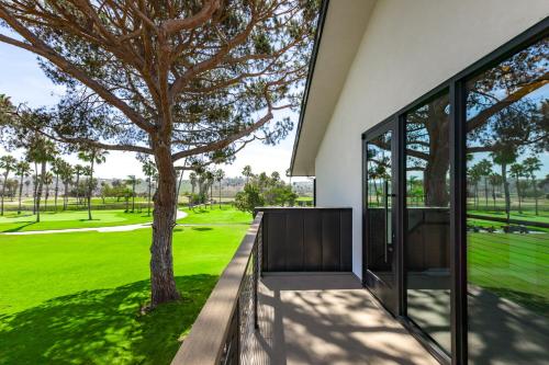 a house with a view of a tree at Guesthouse Hotel at La Valle in Rancho Santa Fe