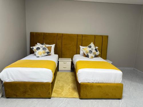 Llit o llits en una habitació de BNG Suite 4