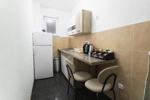 Foto myQuartier Central City Suites digital self check in 4