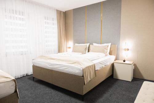 Foto myQuartier Central City Suites digital self check in 1