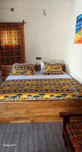 Llit o llits en una habitació de Hotel Eyram