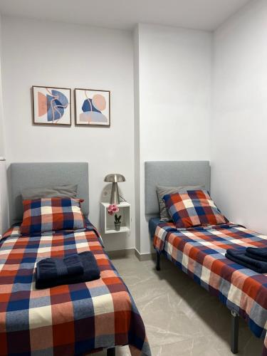 Apartment with rooftop pool 150 m from the beach