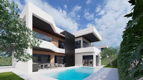 a house with a swimming pool in front of it at Villa Liam i Villa Zoe in Ližnjan