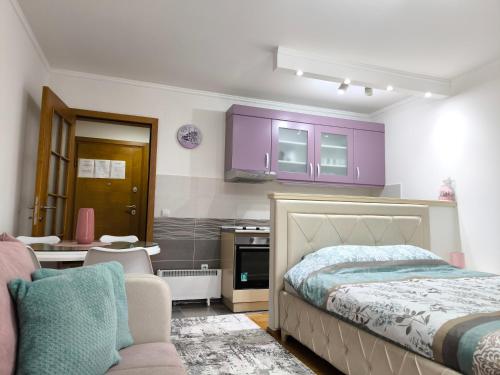 Krevet ili kreveti u jedinici u objektu Alex 2 apartman