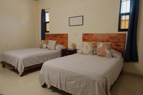Llit o llits en una habitació de Hanna Suite