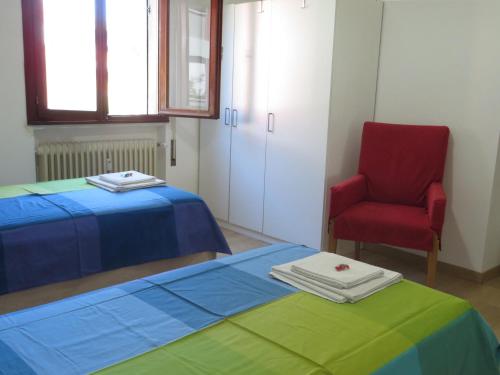 Кровать или кровати в номере Casa Patavina