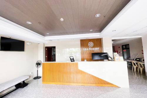 a lobby of a hospital with a reception desk at Lea Robert Hotel Angeles City in Angeles